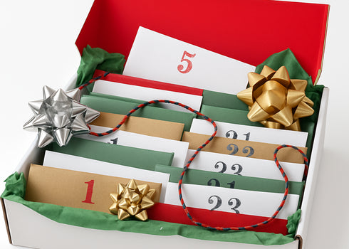 Advent calendar with numbered Envelopes in a decorative box